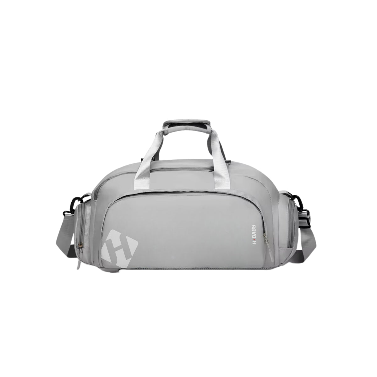 Un bolso de viaje gris con asa superior, correa ajustable para el hombro y un logotipo gris con una «H» estilizada en la parte frontal, presentado sobre un fondo blanco liso.